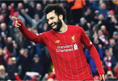  ?? Picture: AFP ?? ANOTHER ONE. Liverpool’s Mohamed Salah celebrates scoring his team’s fourth goal during their English Premier League match against Southampto­n at Anfield on Saturday.