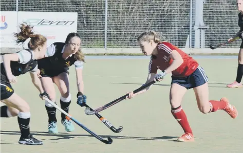  ??  ?? Captain Robyn Gribble (red) scored a hat-trick for City of Peterborou­gh Ladies against Maidstone.