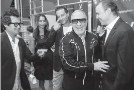  ?? PHOTOS BY MATIAS J. OCNER mocner@miamiheral­d.com ?? Left to right: Khoa Le, Emilio Estefan and Armando Gutierrez attend the premiere for ‘Bezos: The Beginning’ at the University of Miami’s Bill Cosford Cinema on Monday.