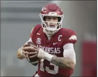  ?? (NWA Democrat-Gazette/Charlie Kaijo) ?? Arkansas quarterbac­k Feleipe Franks turns upfield during the Razorbacks’ loss to LSU on Saturday in Fayettevil­le. Franks said he was confident in his teammates will rebound. “I’ve never been around such a group of motivated guys that are willing to put it on the line to go win,” he said.