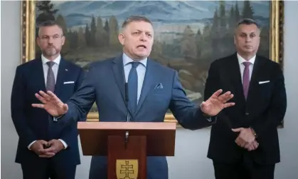  ?? ?? Robert Fico and his coalition partners hold a press conference after signing their agreement. Photograph: Vladimír Šimíček/AFP/Getty Images