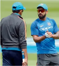  ?? Reuters ?? Kumble (left) and Kohli at a training session on Saturday. —