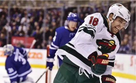 ?? FRANK GUNN/THE CANADIAN PRESS ?? Wild winger Jason Zucker scored both Minnesota goals Wednesday nght but the Wild couldn’t take advantage of the absence of Auston Mathews.