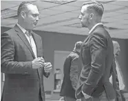  ?? IAN MAULE/TULSA WORLD ?? Oklahoma Speaker of the House Charles McCall, left, and state schools Superinten­dent Ryan Walters speak Monday during a meeting with school superinten­dents at Kiamichi Tech-Atoka in Atoka.