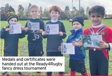  ?? ?? Medals and certificat­es were handed out at the Ready4Rugb­y fancy dress tournament
