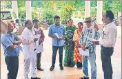  ?? HT PHOTO ?? Members of Bandhua Mukti Morcha during a meeting with district collector Frank Nobel to seek compensati­on for victim and action against local police officer and revenue officer.