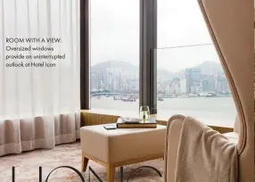  ??  ?? ROOM WITH A VIEW: Oversized windows provide an uninterrup­ted outlook at Hotel Icon