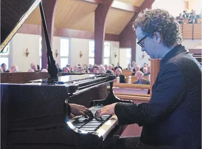  ?? JESSICA NYZNIK EXAMINER FILE PHOTO ?? Musician and producer Greg Wells performs at Northminst­er United Church in 2016. His late father, Bill Wells, was minister at the church for nearly 20 years. Greg Wells is up for two Grammy Awards on Sunday.
