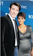  ?? MARK DAVIS/GET TY IMAGES ?? Goran Visnjic, left, and Halle Berry star in Extant, a new sci-fi thriller produced by Steven Spielberg.