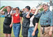  ?? 08_a26afday16 ?? Saluting the spirit of Armed Forces Day are, left to right, forces’ sweetheart Amanda Cowan, landgirl Amanda Duffy Brown, Wren officer Corrina Charlwood and landgirls Michaela King and Helen Gillies.