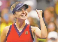  ?? SETH WENIG/ASSOCIATED PRESS ?? Elina Svitolina of Ukraine reacts after defeating Simona Halep of Romania during the fourth round of the U.S. Open on Sunday in New York.
