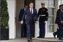  ?? ANDREW HARNIK — THE ASSOCIATED PRESS ?? House Speaker Mike Johnson arrives to speak to members of the media outside the West Wing at the White House in Washington on Tuesday after meeting with President Joe Biden.