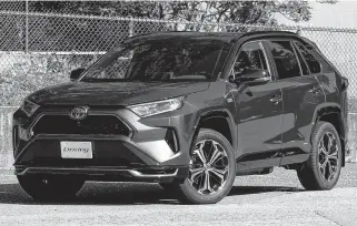  ?? ANDREW MCCREDIE • POSTMEDIA NEWS ?? With nearly 80 kilometres of all-electric range before the 2.5-litre gas engine kicks in, the 2021 Toyota RAV4 Prime is one of the best plug-in hybrids on the market.