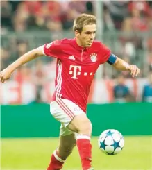 ?? — AFP ?? This file photo taken on April 12, 2017 shows Bayern Munich’s defender Philipp Lahm running with the ball during the first-leg quarter final Champions league match against Real Madrid at the Allianz arena in Munich.