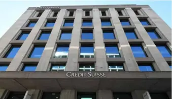  ?? XINHUA/VNA Photo ?? A building of Credit Suisse in Geneva, Switzerlan­d.