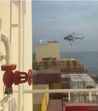  ?? (Reuters) ?? A HELICOPTER RAID on ‘MSC Aries’ obtained from a social media video released last Saturday.