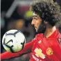  ??  ?? BACK TRACK Fellaini was needed to help out defence