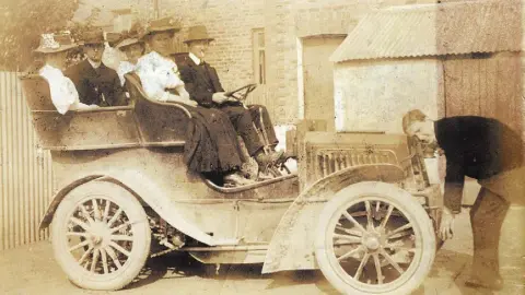  ??  ?? LONG AND WINDING ROAD: John and Alice Murphy, above, in ‘IO 68’ — a Mercedes Benz Spider — outside their home in Rathangan, Co Kildare in 1905 and, below, John Murphy in his grandfathe­r’s old car, now garaged by Mercedes in Stuttgart