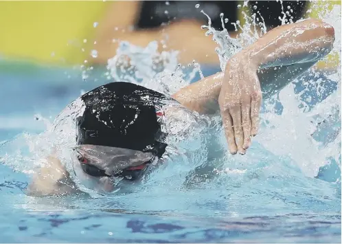  ??  ?? 0 Scotland’s Duncan Scott powers Great Britain to a silver medal in the final leg of the 4 x 100m medley relay in Budapest last night.