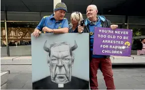  ?? GETTY IMAGES ?? People wait outside Melbourne County Court as Cardinal George Pell is sentenced to six years in jail for sexually assaulting children.