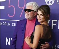  ?? AP file ?? FAMILIAR DUO: Writer-director Pedro Almodovar, left, and actor Penelope Cruz attend the October premiere of ‘Parallel Mothers at the closing night of the New York Film Festival.