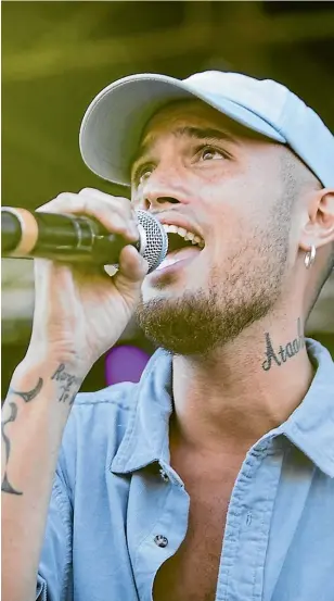  ??  ?? Stan Walker is to donate a portion of his ticket sales from his upcoming tour to the cancer research centre headed up by Professor Parry Guilford, seen left with Dr Karyn Paringatai, who has the same gene mutation as Walker.