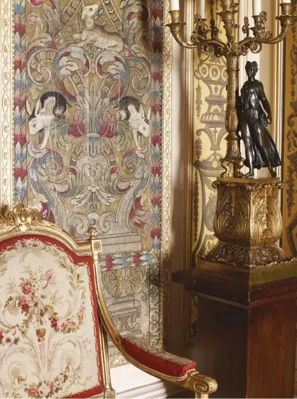  ??  ?? ABOVE In the Music Room, the embroidere­d panels depicting rabbits and lambs, as well as other animals, are 16th- century and came from the Malatesta Palace in Italy. The giltwood fauteuil in the style of Louis XVI, upholstere­d with Aubusson panels, and...