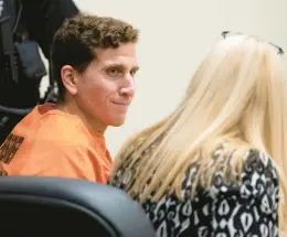  ?? TED S. WARREN/AP ?? Bryan Kohberger, left, who is accused of killing four University of Idaho students in November, looks toward his attorney, public defender Anne Taylor, during a hearing Jan. 5 in Latah County District Court in Moscow, Idaho.