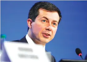  ?? AP PHOTO/ALBERTO PEZZALI, FILE ?? Secretary of Transporta­tion Pete Buttigieg speaks at the COP26 U.N. Climate Summit in Glasgow, Scotland, on Nov. 10.