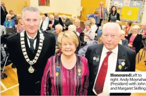  ??  ?? Honoured Left to right Andy Moynahan ( President) with John and Margaret Skilling