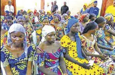  ?? REUTERS ?? The released girls were welcomed in Abuja on Sunday.