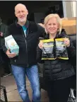  ?? SUBMITTED PHOTO ?? Gordon and Sue Kriebel, owners of Perk Valley Pet Eatery, Royersford, at the Daily Bread Community Food Pantry. The store is also participat­ing in the initiative.