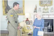  ?? REUTERS ?? In this file photo, Britain’s late queen, Elizabeth II, greets Australian SAS Corporal Ben Roberts-Smith, who had been awarded the Victoria Cross for Australia, at Buckingham Palace in London, Nov 15, 2011.