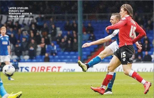  ?? PICTURES: Action Images ?? LATICS LEVELLER: Oldham’s Carl Winchester scores to rescue a point