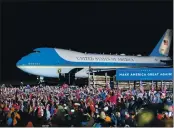  ?? JACK RENDULICH — THE ASSOCIATED PRESS ?? The crowd cheers as Air Force One arrives with President Donald Trump at Duluth Internatio­nal Airport on Sept. 30.