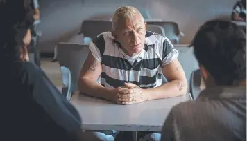  ??  ?? 007 Daniel Craig looks different as a bleach-blond, tattooed Joe Bang.
