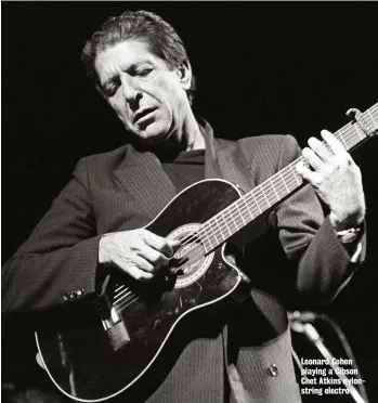  ??  ?? Leonard Cohen playing a Gibson Chet Atkins nylonstrin­g electro