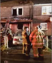  ?? PHOTO COURTESY OF WILLIAM RIGBY ?? Authoritie­s investigat­e a fire that damaged a home on the 1200 block of Honan Street in Chester on Saturday night.