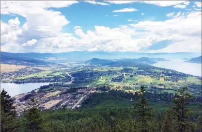  ?? The District of Lake Country ?? From Spion Kop in the District of Lake Country, you can see four lakes, including three in this photograph — Okanagan Lake (right) along with Wood Lake and Duck Lake.