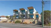  ?? ?? A New Brighton beachfront apartment complex was sold at auction for $3.12m.