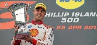  ?? GETTY IMAGES ?? Ford Falcon driver Scott McLaughlin with the trophy.