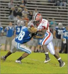  ?? Photos courtesy J.S. Garber ?? Neshaminy halfback Nate Hall, No. 31, right, rushed for three touchdowns, helping the Redskins to a 42-33 win Oct. 19 at Bensalem.