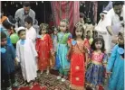  ??  ?? Children take part in the Garangao celebratio­ns of Radio Olive and Radio Suno in Doha