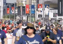  ?? AP FILE ?? In this June 29 photo, many of the fans attending the Red SoxYankees game in London arrived wearing MLB gear.