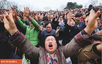  ??  ?? ■ About 10,000 South Korean Christians pray for peace and denucleari­sation during an Easter service rally at Yeonsei University in Seoul.