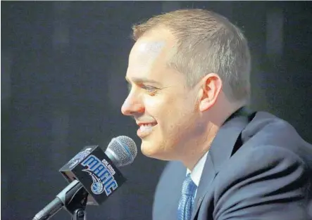  ?? JACOB LANGSTON/STAFF PHOTOGRAPH­ER ?? Frank Vogel, who was introduced as the Magic’s new coach at a media conference Monday, has won 58 percent of his regular-season games.