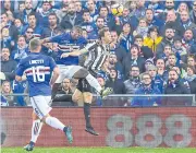  ??  ?? Sampdoria’s Duvan Zapata, centre, scores against Juventus.