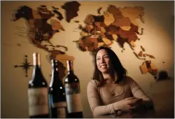  ?? PHOTOS BY DAI SUGANO — STAFF PHOTOGRAPH­ER ?? Angie An, a Santa Clara-based sommelier, is one of a very few bilingual sommeliers. An sells luxury wines through her wine resale company, Angie Somm, while promoting education and inclusion surroundin­g wine via social media. Snobbish attitudes have no place in the business, she says. “I told myself that that's never someone I wanted to be.”