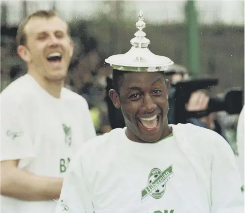  ??  ?? Russell Latapy celebrates Hibs’ promotion to the SPL in season 1998/99 as team-mate Franck Sauzee looks on.