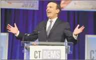  ?? H John Voorhees III / Hearst Connecticu­t Media ?? U.S. Sen. Chris Murphy accepts his party’s nomination to run for a second term Friday night at the State Democratic Convention in Hartford.